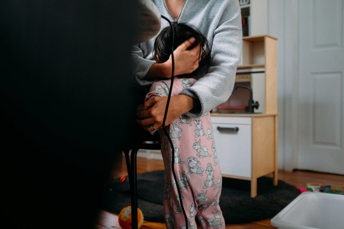 Image of a parent comforting their child using skills learned from Psychology Resource Hub